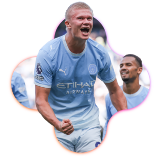 Manchester City football players celebrating on the pitch.