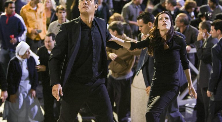 Tom Hanks as Robert Langdon, and Ayelet Zurer as Vittoria Vetra. Harvard symbologist Robert Langdon works to solve a murder and prevent a terrorist act against the Vatican.