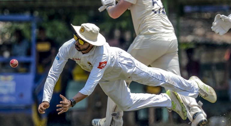Sri Lanka Board President's XI Sadeera Samarawickrama (L) drops a catch of England's Dom Sibley (C) during the opening day of a four-day practice match between Sri Lanka Board President's XI and England at the P. Sara Oval Cricket Stadium in Colombo on March 12, 2020. - England will play two test matches against Sri Lanka during their tour of Sri Lanka under the ICC World Test Championship. (Photo by LAKRUWAN WANNIARACHCHI / AFP) (Photo by LAKRUWAN WANNIARACHCHI/AFP via Getty Images)