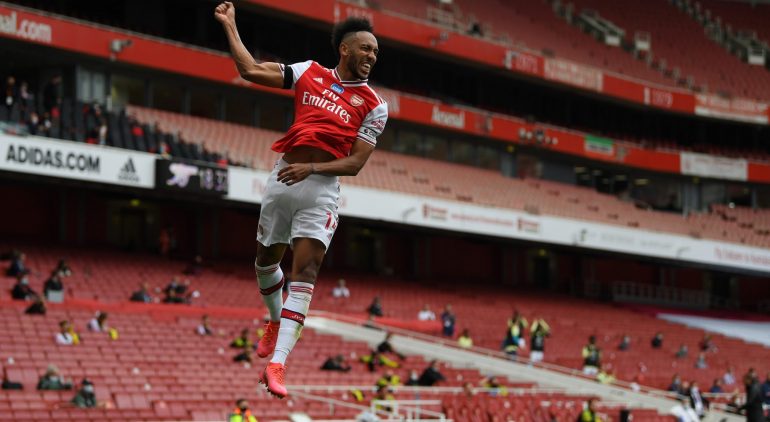 LONDON, ENGLAND - JULY 01:  Pierre-Emerick Aubameyang of Arsenal celebrates after scoring the first goal during the Premier League match between Arsenal FC and Norwich City at Emirates Stadium on July 01, 2020 in London, England. (Photo by Shaun Botterill/Getty Images)
