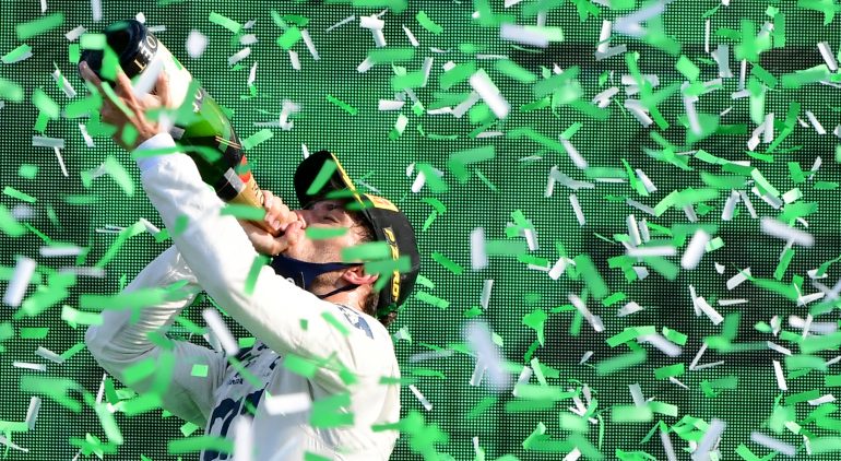 TOPSHOT - Winner AlphaTauri's French driver Pierre Gasly drinks champagne on the podium after the Italian Formula One Grand Prix at the Autodromo Nazionale circuit in Monza on September 6, 2020. (Photo by JENNIFER LORENZINI / POOL / AFP) (Photo by JENNIFER LORENZINI/POOL/AFP via Getty Images)
