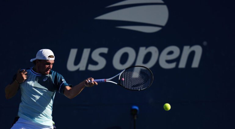 US Open Tennis Dominic Stricker, of Switzerland, returns a shot to Benjamin Bonzi, of France, during the third round of the U.S. Open tennis championships, Friday, Sept. 1, 2023, in New York. (AP Photo/Frank Franklin II)